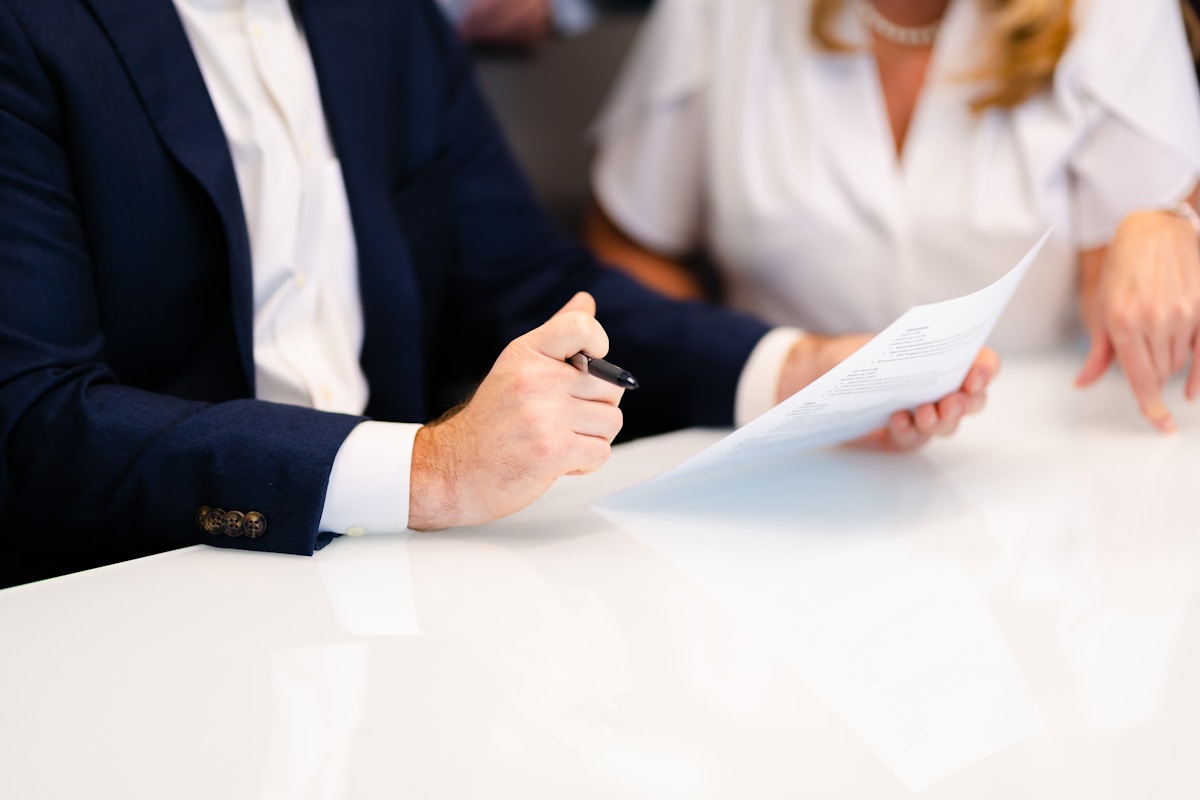 Professional real estate investment meeting in a modern office